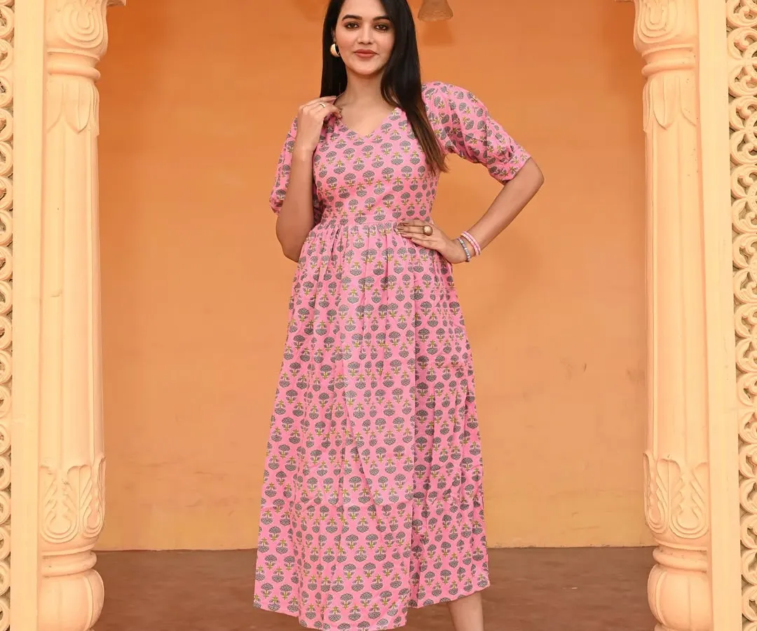 My traditional Bagru hand-block printed cotton dress in a lovely pink. This one-piece dress features charming puff sleeves and is made from breathable 60*60 pure cotton, ensuring both comfort and style.