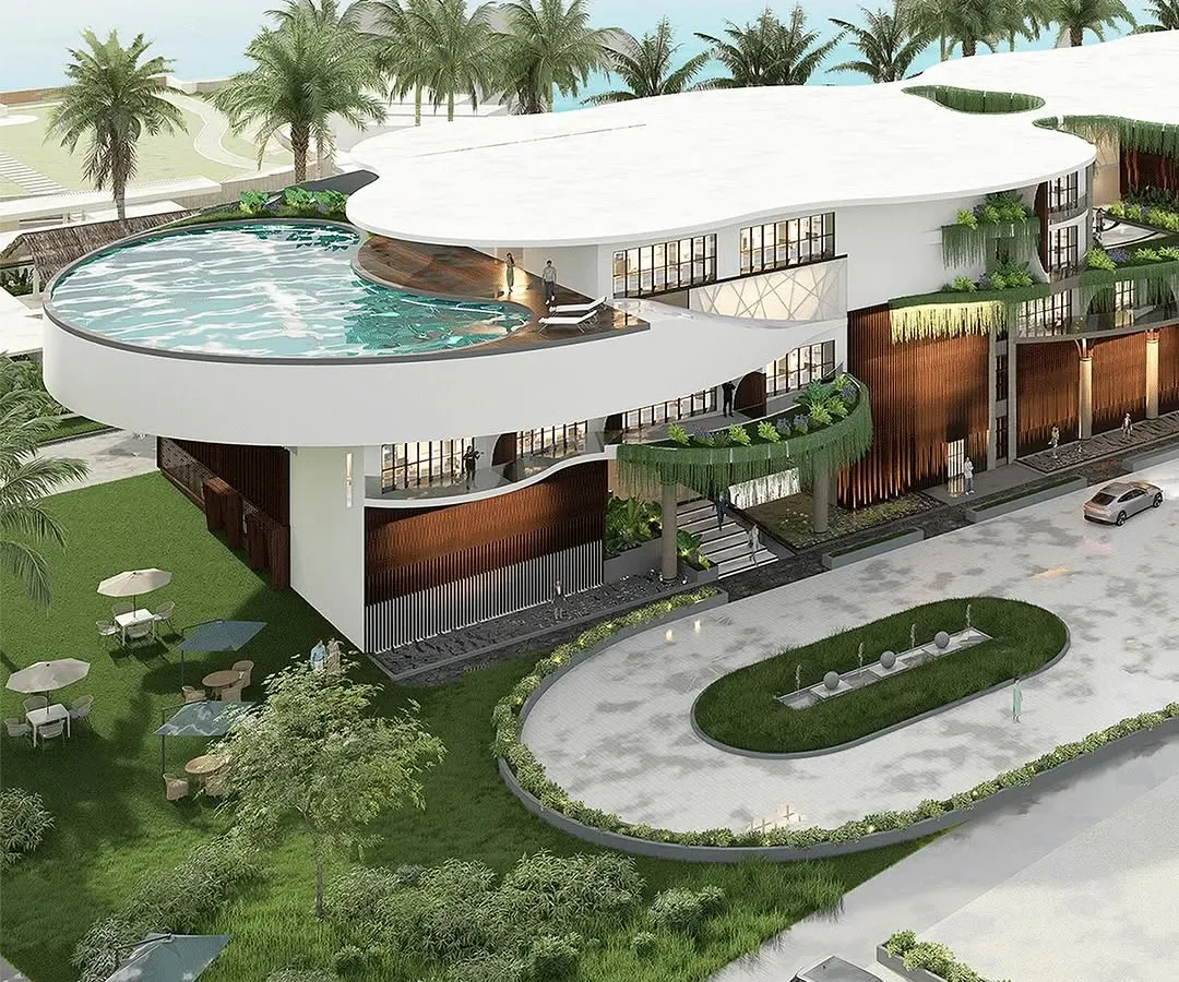 For this seaside business hotel in Mangaluru, I designed a rooftop infinity pool that offers panoramic views of the ocean. The architecture's fluid, wave-like forms and the integration of green spaces create a luxurious, resort-style atmosphere that connects guests with the coastal environment.