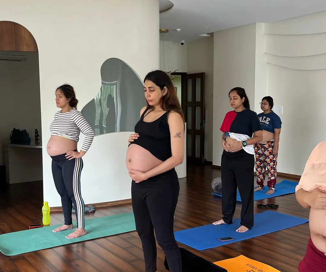 In a quiet moment, we pause. This is more than a pose; it's a conversation with the new life you are nurturing. I encourage you to connect with your body and your baby, feeling the profound changes happening within.