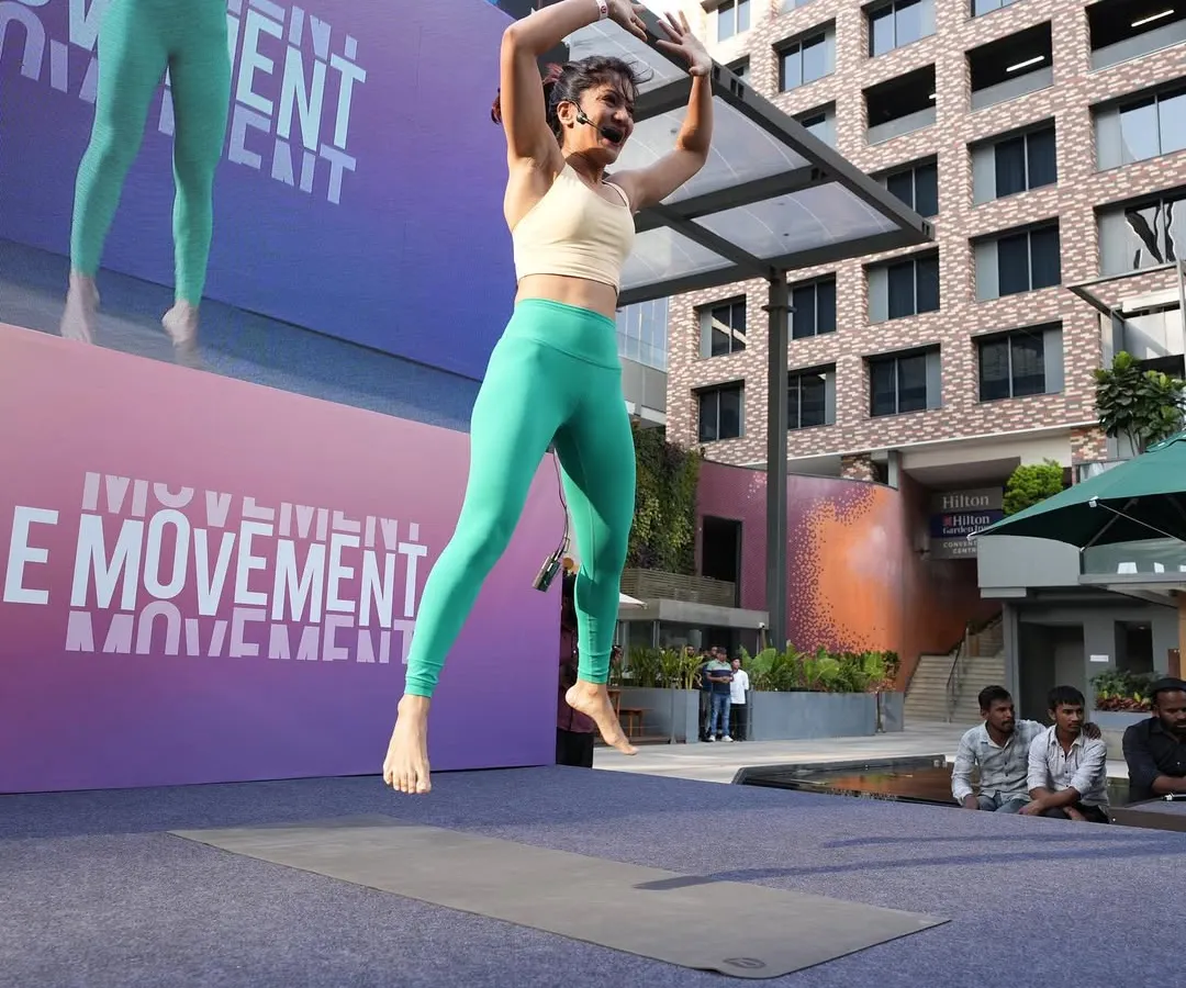 The energy of a live event is electric! Here I am, leading an incredible session for the team at Lululemon. This is what my corporate wellness programs are all about: boosting morale, building connection, and getting everyone into the movement.