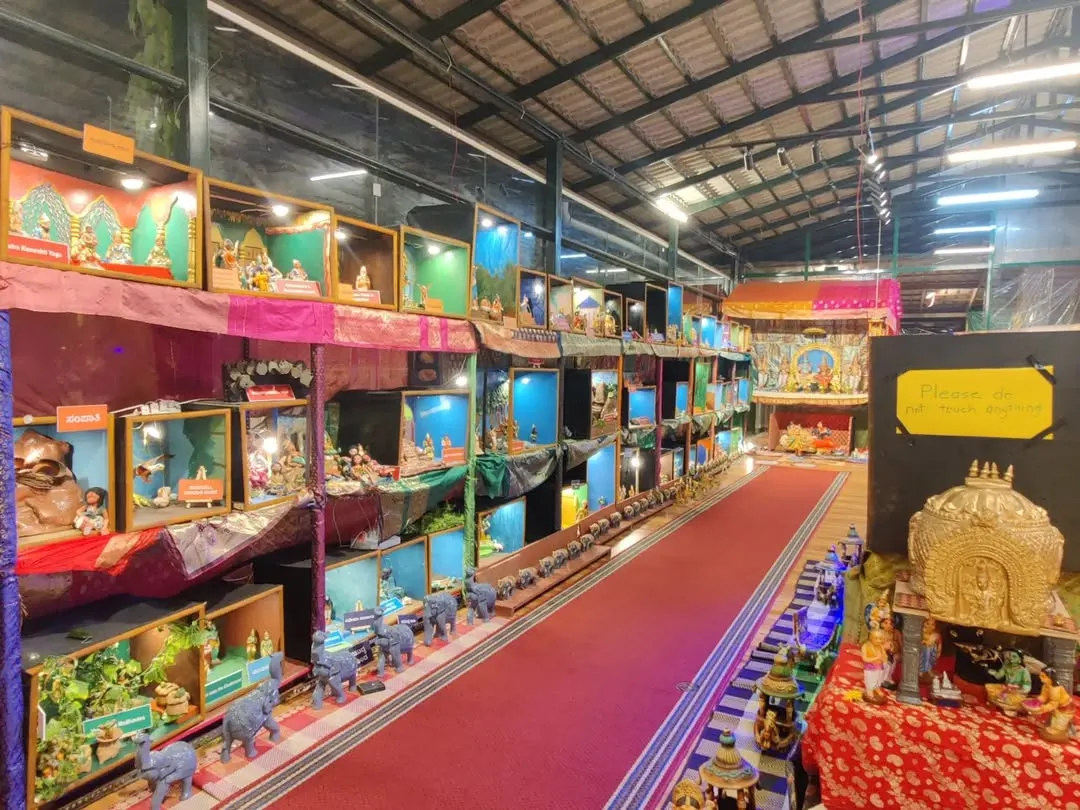 A view of our annual Dhaatu Navarātra Mahotsava. The entire hall is transformed into a landscape of stories, with thousands of dolls arranged in intricate dioramas that depict scenes from our epics and the vibrant life of Bharat.