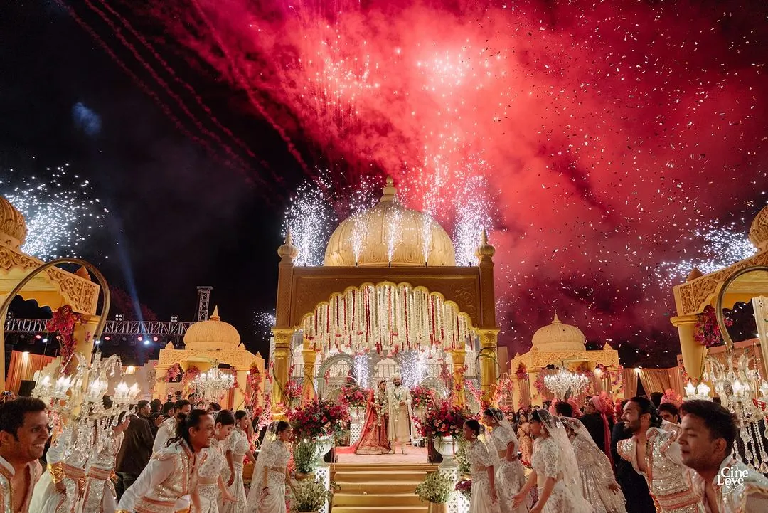 A moment of pure celebration as fireworks illuminate the sky above our custom-built 'Shahi Jharokha' stage. My goal is to frame these timeless memories with architectural grandeur and explosive joy, creating a truly unforgettable spectacle.
