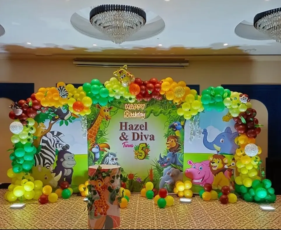 Our jungle theme birthday parties are a huge hit with kids. We create a complete environment with a large themed backdrop, colorful balloon arches, and character cutouts like zebras, lions, and giraffes to bring the safari to your party.