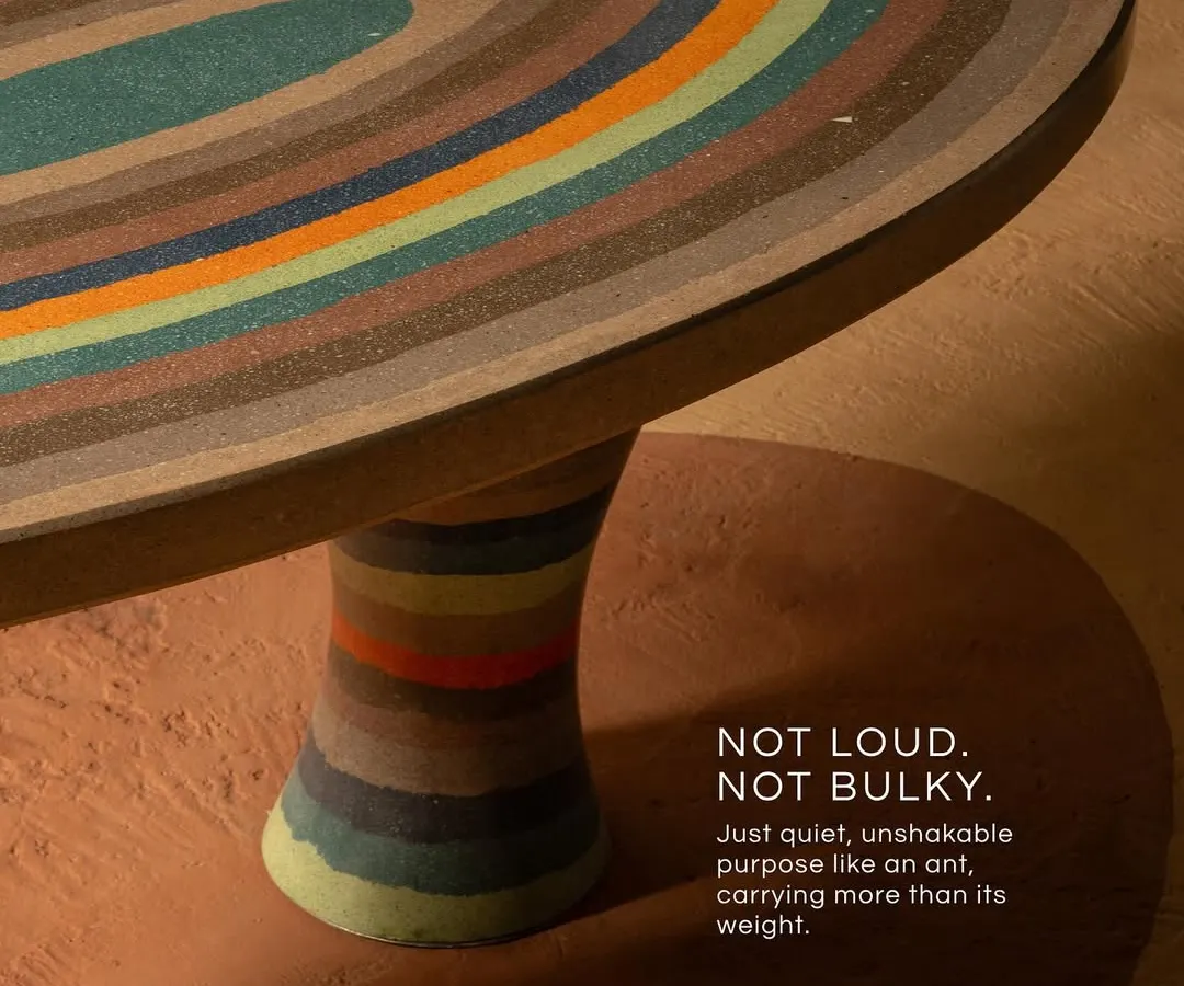 We believe furniture should be functional art. Inspired by the quiet strength of an ant, this terrazzo table combines a sculptural form with a richly textured, multi-colored surface, creating a piece that grounds the room with its unique presence.