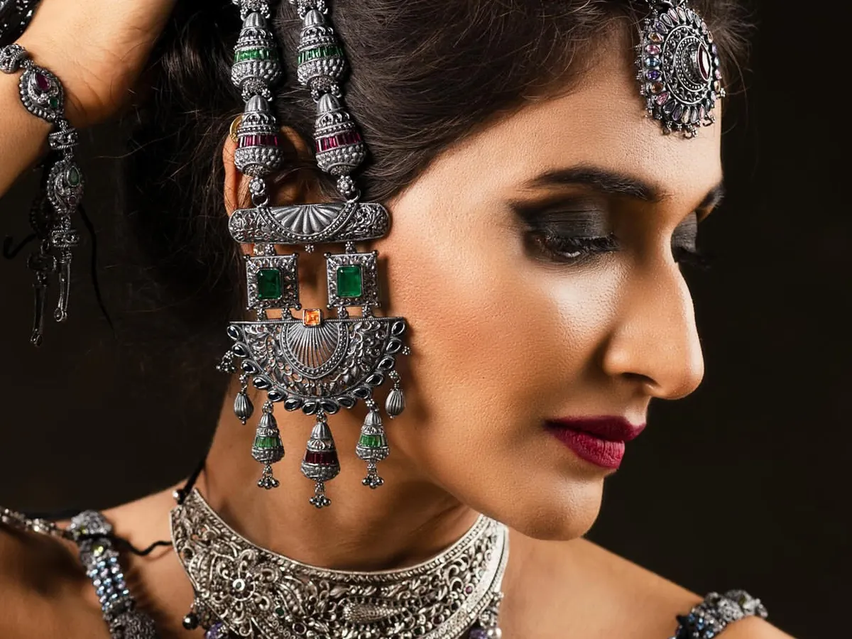 For this jewellery campaign, the focus was on creating a dramatic, high-fashion look. I used a dark, intense smokey eye and a deep berry lip to complement the intricate details of the oxidised silver jewellery, making the entire look camera-ready and impactful.