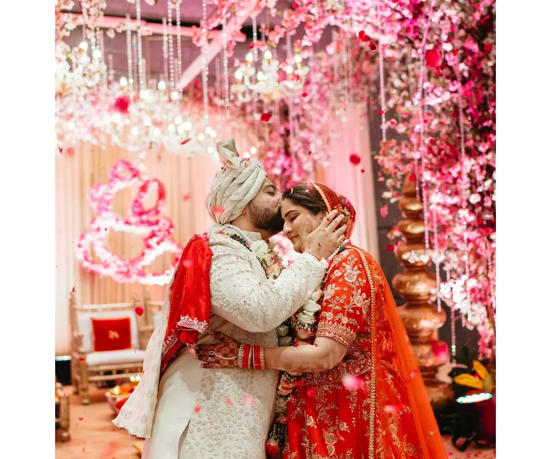 The moment the world fades away. I live for these explosions of joy, like this varmala ceremony, where a shower of flowers marks the beginning of a lifetime of laughter and love. It's pure, unscripted magic.