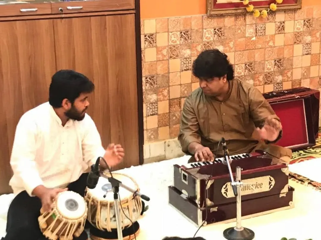 I am here today because of the blessings and teachings of my Guruji, Pandit Subhankar Banerjee ji. This photo captures a moment of learning from him, a memory I cherish. Every lesson I teach is a tribute to his guidance.