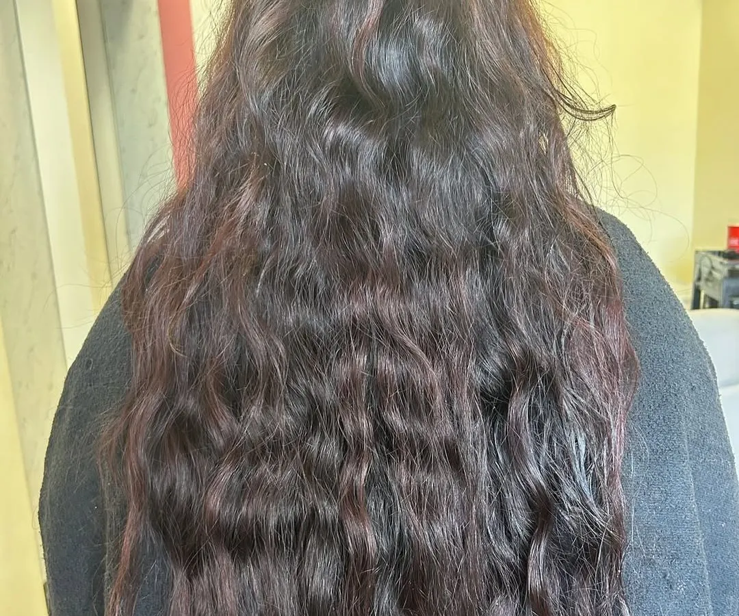 This is the 'before' state of hair that is perfect for my Hair Botox treatment. You can see the effects of damage, with significant frizz, dryness, and a lack of shine and manageability. This is the starting point from which we achieve a total hair transformation.