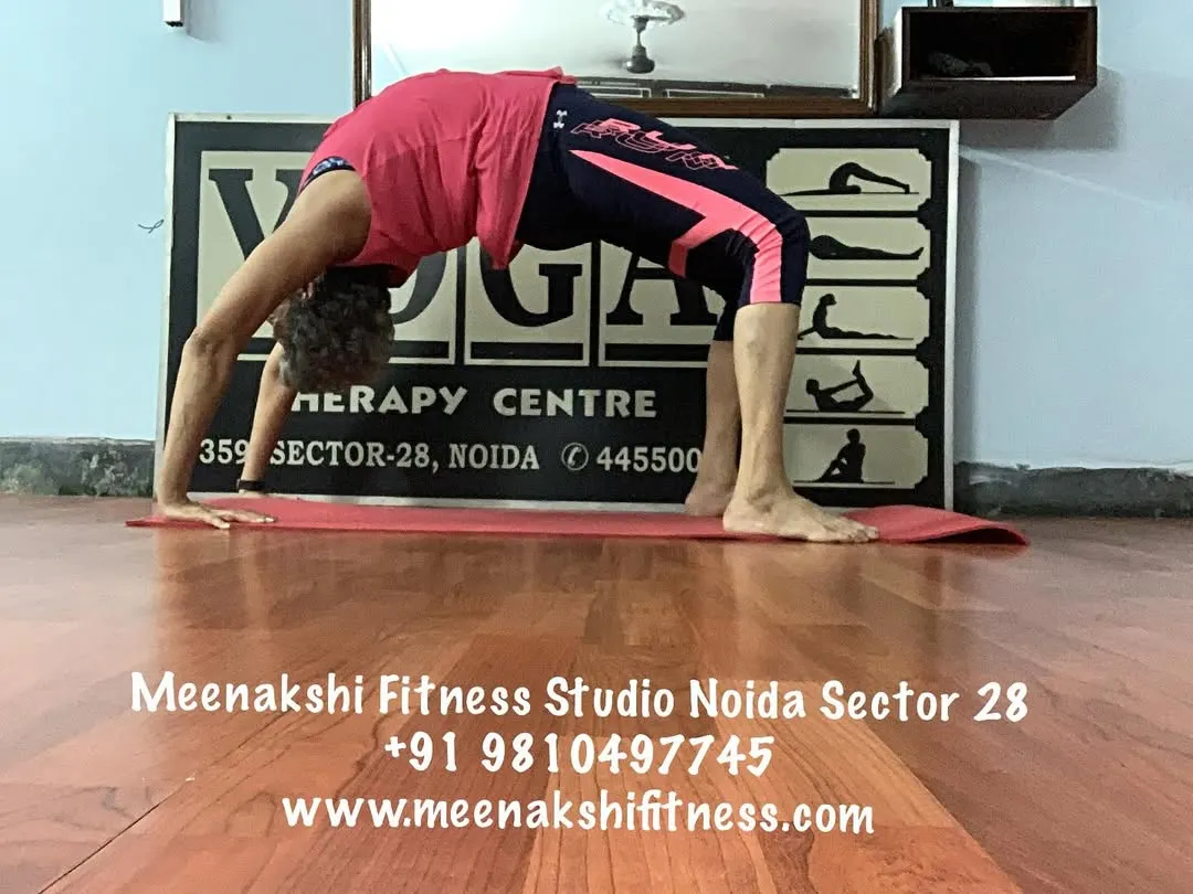 The Chakrasana, or Wheel Pose, is a powerful backbend that energizes the entire body. I guide my students to build the necessary shoulder, arm, and spinal strength to approach this asana safely.