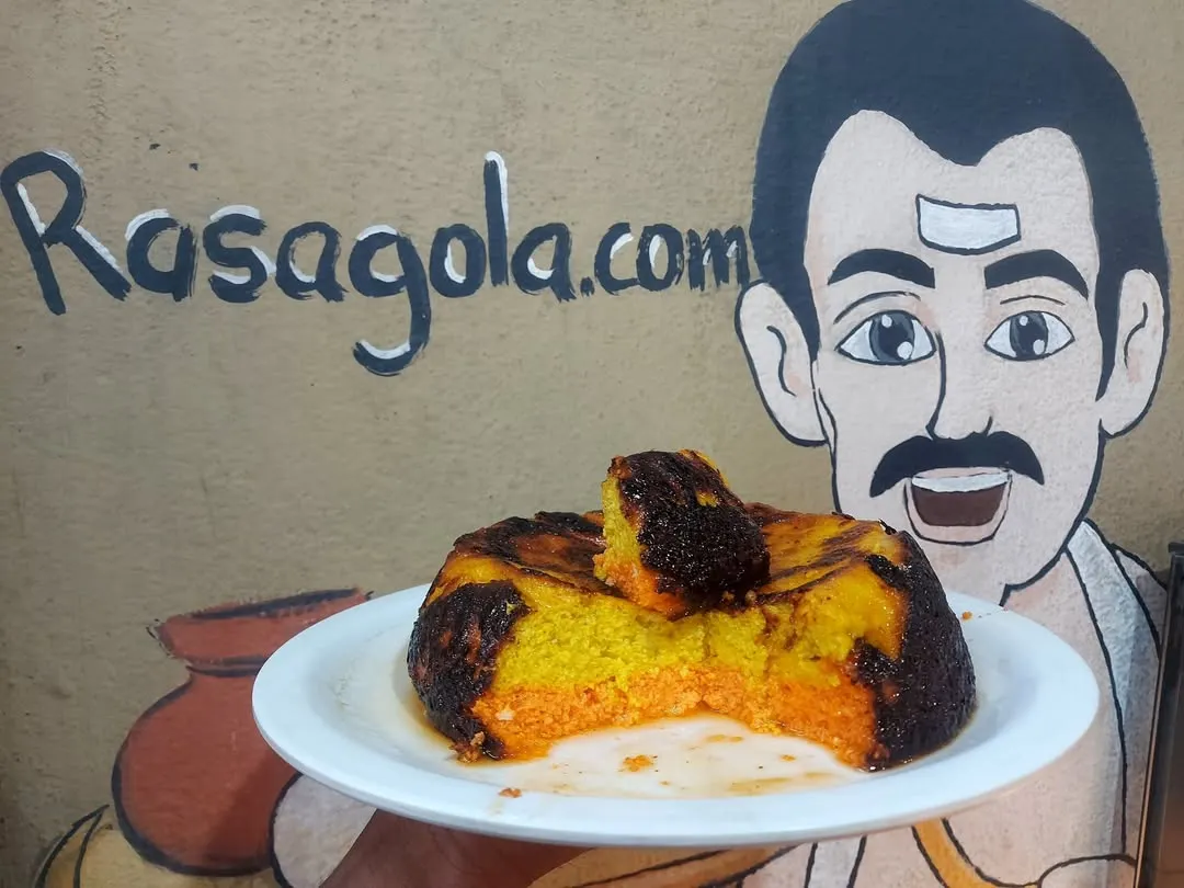 We've given the classic Odia Chhenapoda an innovative twist. This is our Satvik 3-Layer Chhenapoda, blending the traditional baked cheese cake with delicate notes of rose and vanilla for a truly unique dessert.