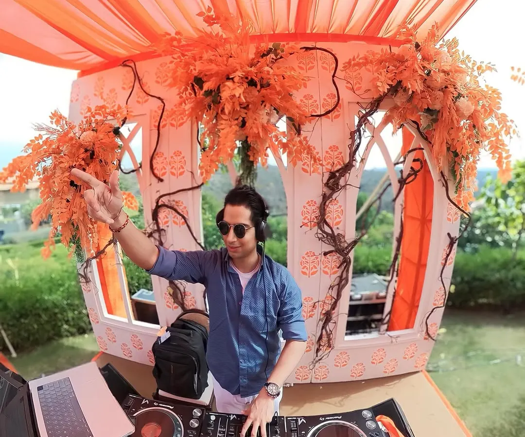Crafting the perfect vibe for a sun-drenched sundowner party. My goal is to match the music to the beautiful setting, creating a relaxed yet celebratory atmosphere for everyone.