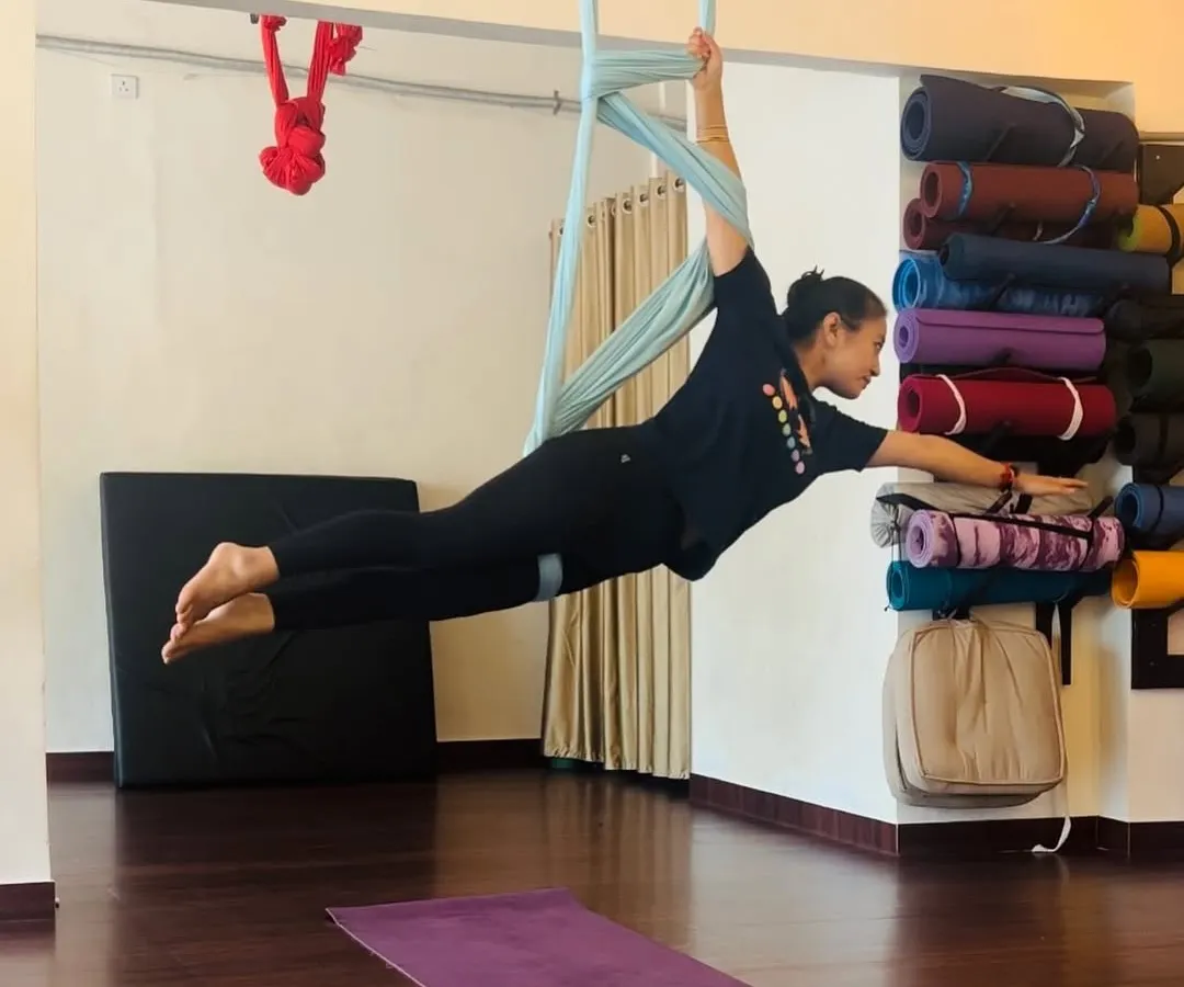 This is what it feels like to fly. This pose requires core engagement and shoulder stability, building strength in a way that feels more like soaring and less like a workout.