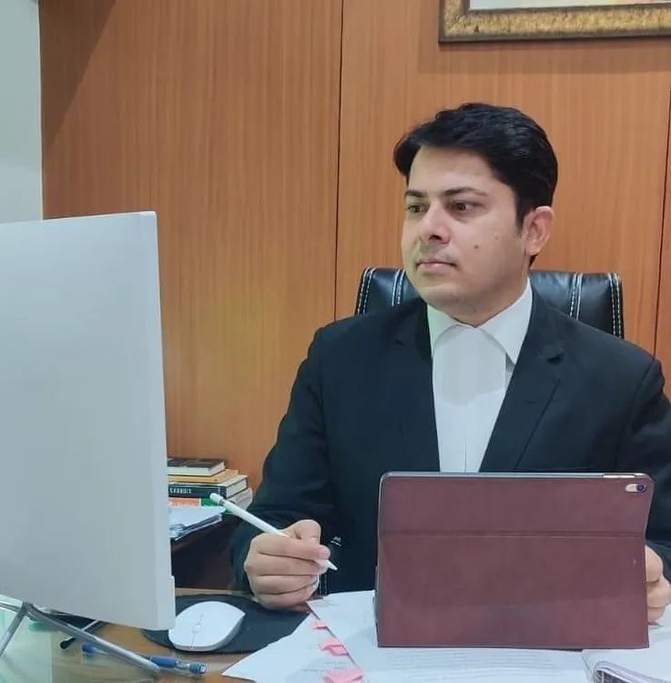 Here I am in my office, preparing for a hearing. Every case receives my full attention, ensuring that every detail is thoroughly reviewed and every legal strategy is soundly developed.