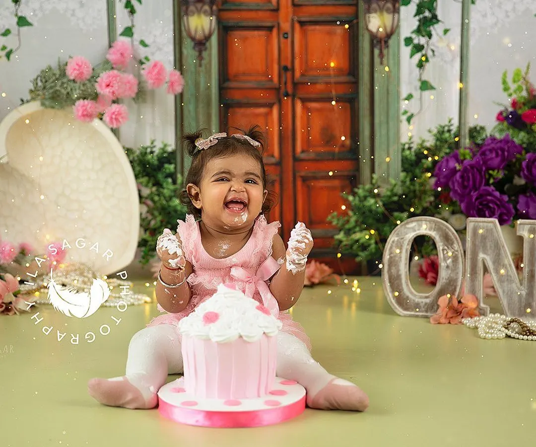 The pure, unfiltered joy of a first birthday cake smash. I love creating these vibrant, personalized setups and then just letting the little ones have the best time, resulting in genuine smiles and laughter.