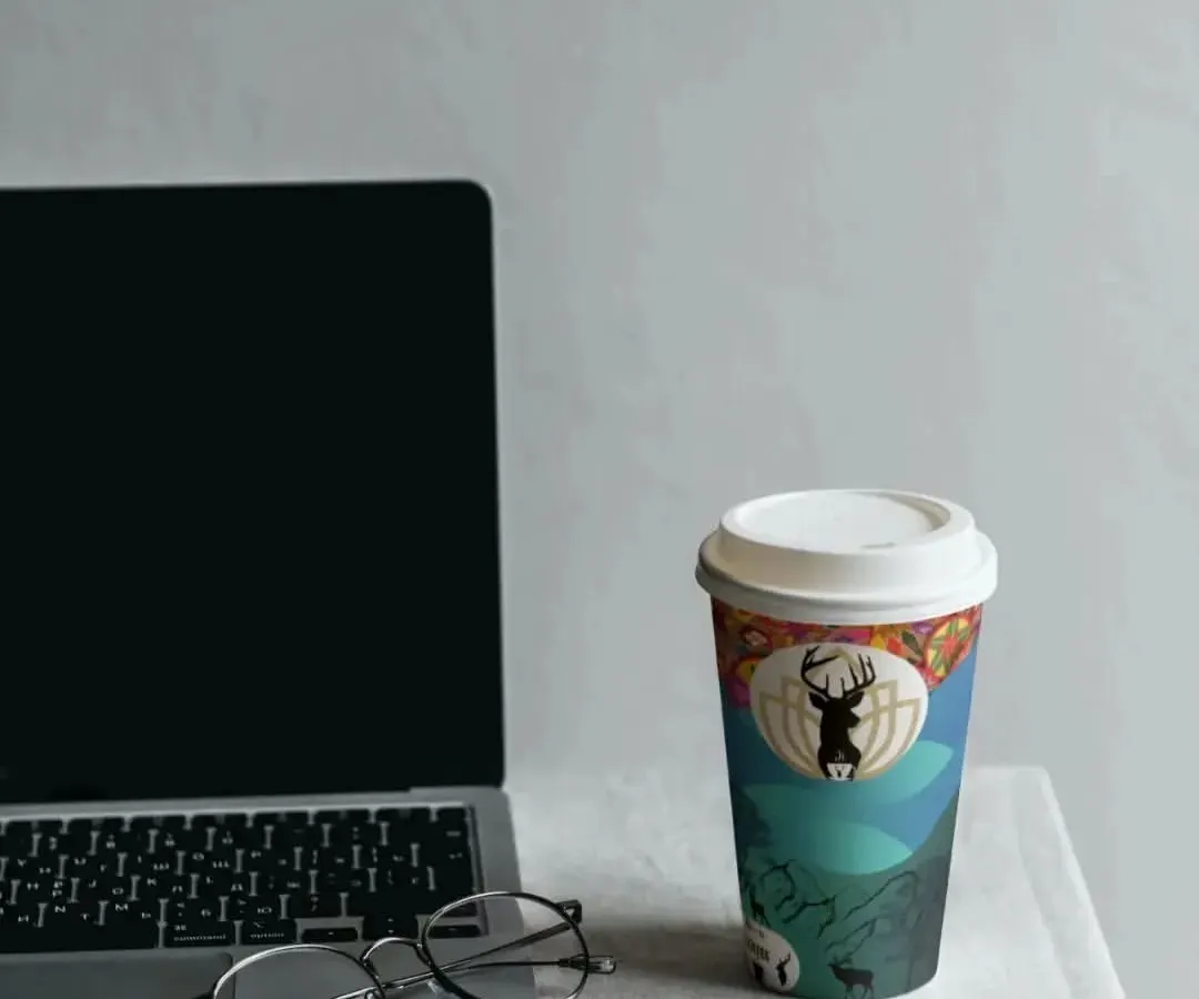This is another look at the same coffee cup packaging concept, this time in a workspace setting. A good design should look great anywhere, whether it's on a cafe table or on your desk.