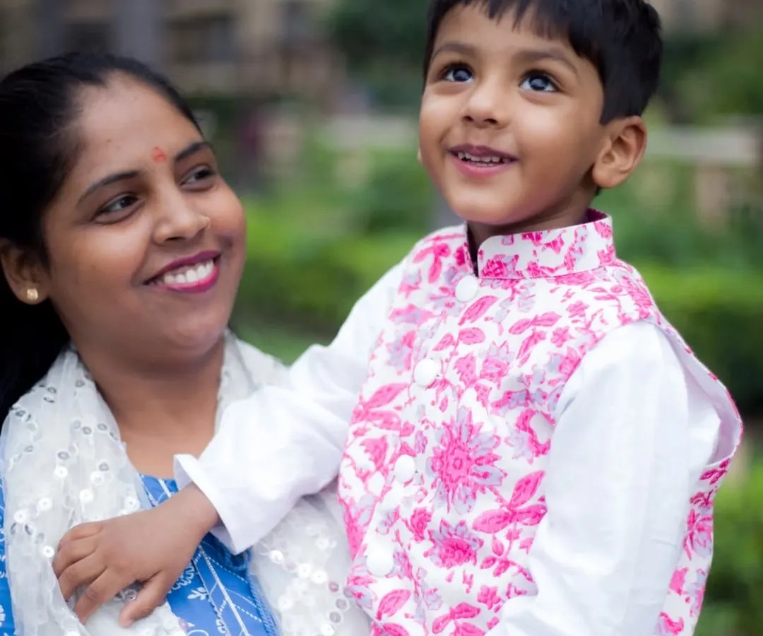 A candid moment between a mother and her son during an outdoor family portrait session. We focus on capturing the natural love and connection within your family.