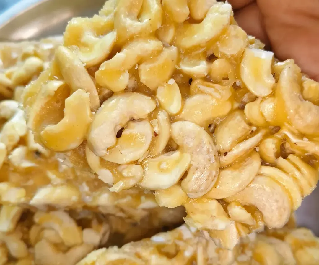 This is my homemade Kaju Chikki, a special customized order. It is made with high-quality cashews, pure jaggery, and a touch of homemade ghee, with absolutely no artificial colors or sugar.