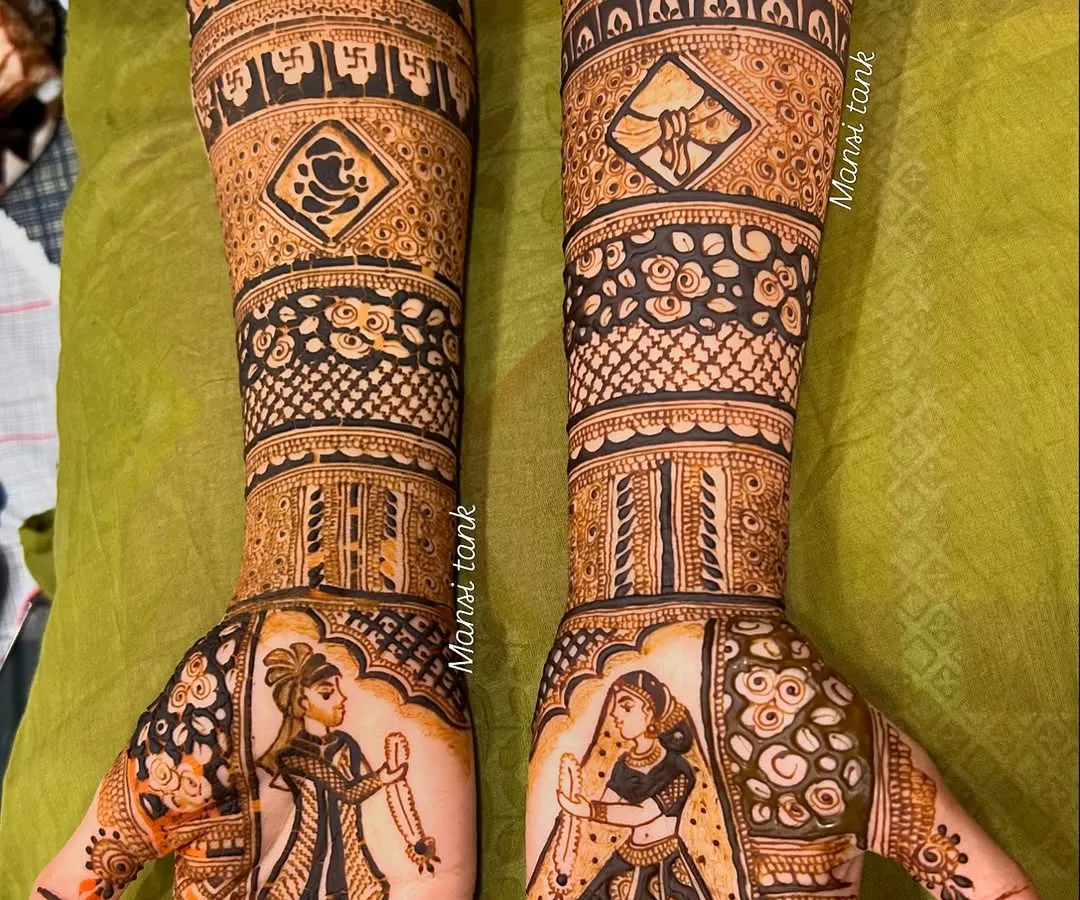 I love bringing a couple's story to life. This full bridal mehendi features custom portraits of the bride and groom, along with religious symbols like the Ganesha, making it deeply personal and unique to their wedding.