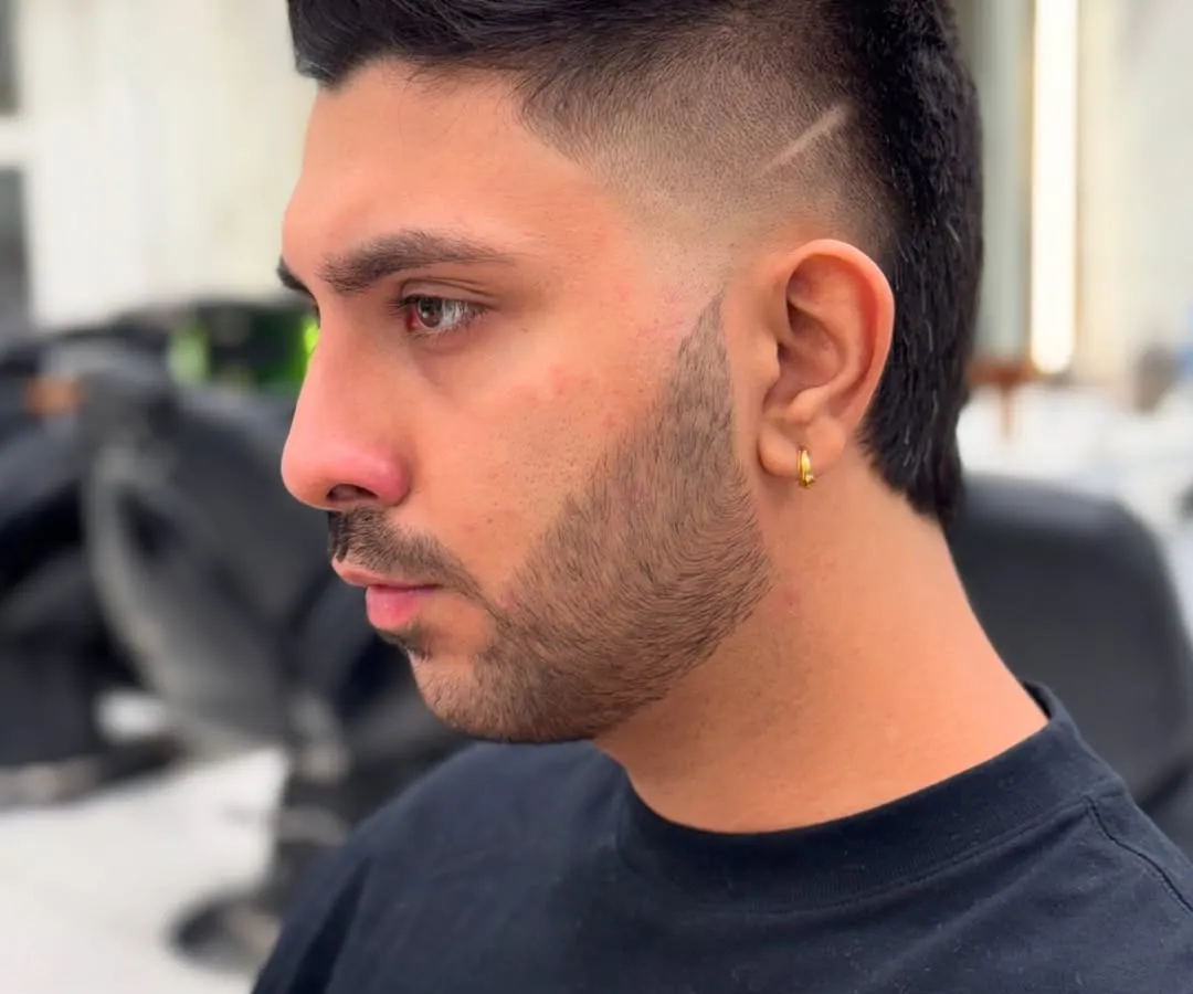Check out this fresh fade with clean lines. I created a modern mullet style, adding a sharp line detail for that extra edge. This is the kind of cut that gets you noticed.