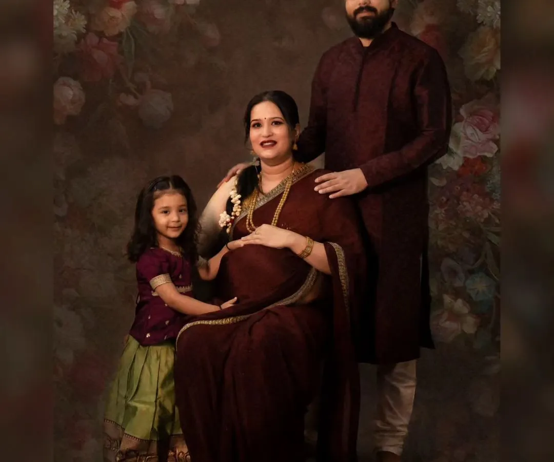 A timeless family portrait captured in our studio with a classic, painterly backdrop. We love including the whole family to celebrate the anticipation of a new arrival, creating a beautiful heirloom for years to come.