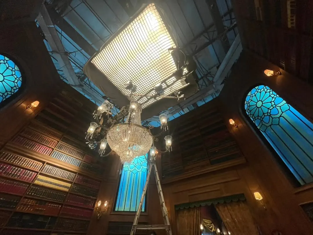 For this television commercial, we engineered a massive overhead rig featuring a Litegear Auroris with a custom 10x10 soft egg crate. The entire setup was suspended on motorized chain hoists, giving the director of photography complete control over this large, soft light source.