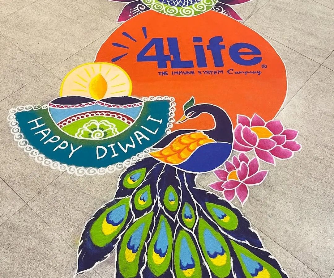 For corporate Diwali events, I integrate company branding directly into the festive art. This large-scale floor rangoli for 4Life features their logo alongside a vibrant peacock and lotus motifs, creating a welcoming and professional atmosphere.