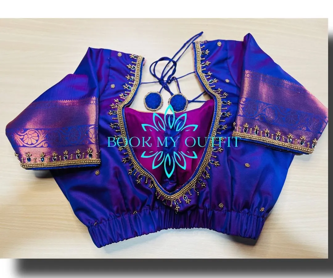 A key part of my service is creating unique blouse designs. This piece features a custom cutout back with delicate tie-ups and intricate zari border work, turning a simple blouse into a statement piece that is tailored for a perfect fit.