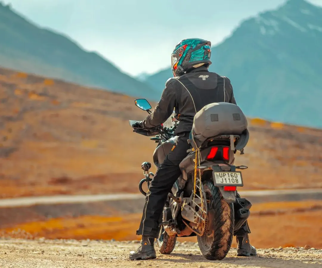 It's not just about the destination. It's about these moments on the road. I specialize in bike trip photography, capturing the rider and their machine against the epic backdrop of the mountains.