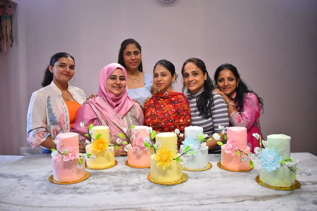 Nothing makes me happier than seeing my students proudly show off their beautiful creations. This is from the finale of our celebration cake masterclass, where everyone designed and finished their own unique cake.