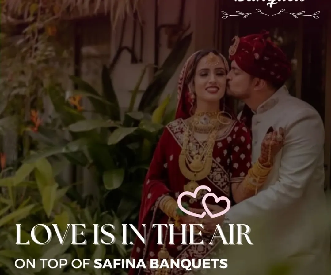 Love is in the air on our rooftop. This intimate moment captures the romance of a wedding at Safina Banquets, with the city lights creating a magical backdrop for your love story.
