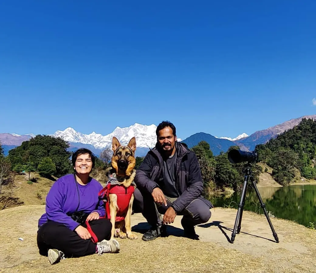 A family portrait with our dog Jiraiya during a trip to Chopta, with the Himalayan peaks creating a breathtaking background. These pet-inclusive vacation sessions are my specialty, capturing your whole family on your greatest adventures.