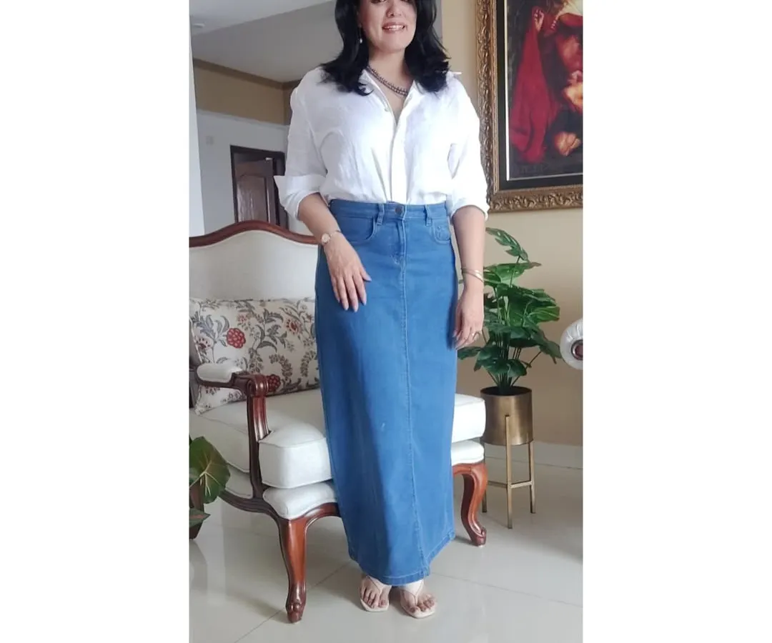 A classic white linen shirt and a long denim skirt is a combination that never fails. It’s comfortable, chic, and incredibly versatile. I can show you how to build a wardrobe with timeless pieces like these that you can wear for years, for any casual occasion.