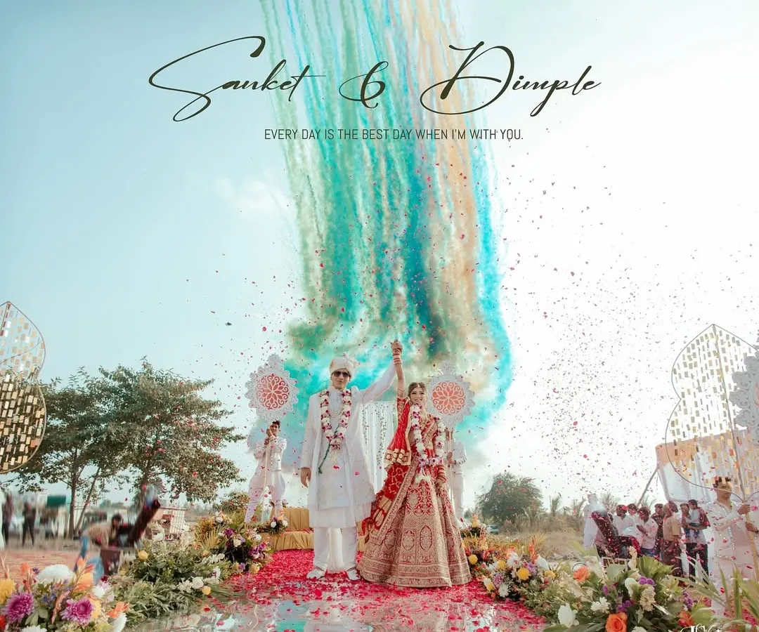 The moment of pure celebration as the couple is showered with vibrant colors. We love capturing the energy and grand scale of Indian weddings, creating images that are full of life and joy.
