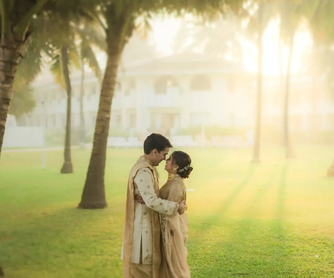 The magic of golden hour at a Goa destination wedding, where the light is as warm as the couple's embrace. We chase this light to create ethereal, romantic portraits that feel both grand and deeply personal.