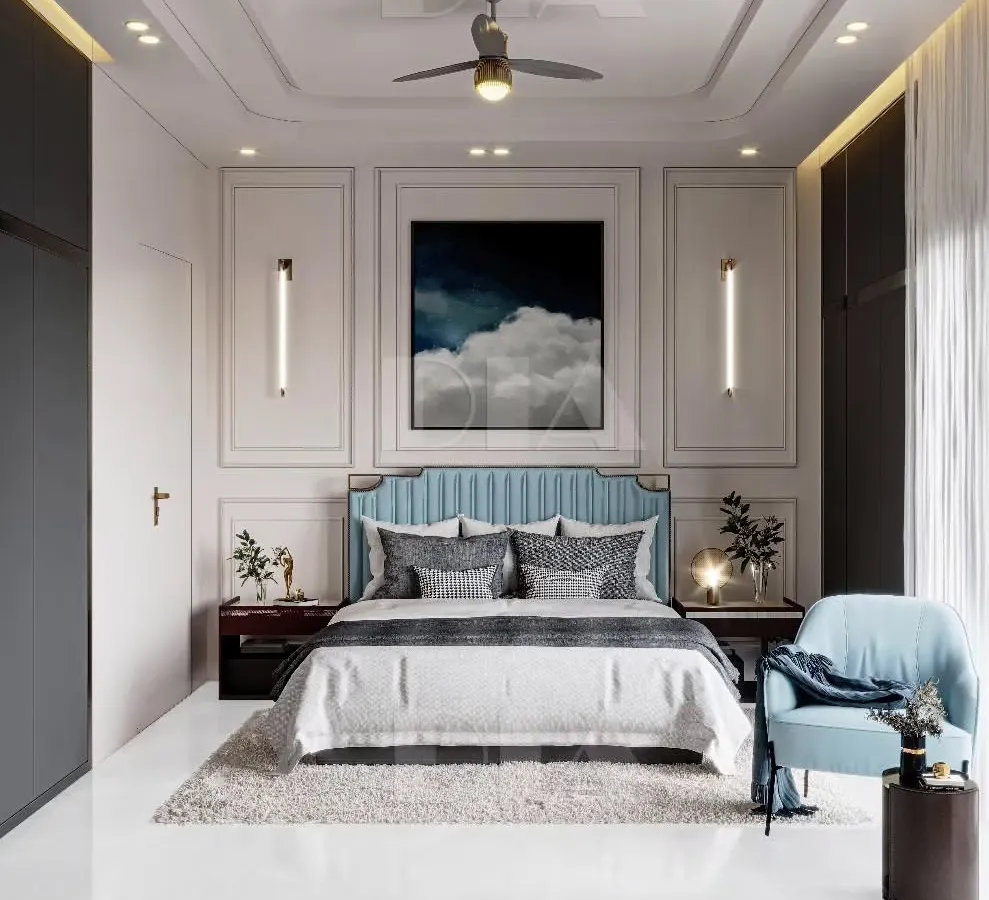 In this contemporary bedroom, I used classic wall molding and a serene blue color palette to create a sense of calm luxury. The vertical sconces and full-height built-in wardrobes add a modern, functional touch to the elegant design.