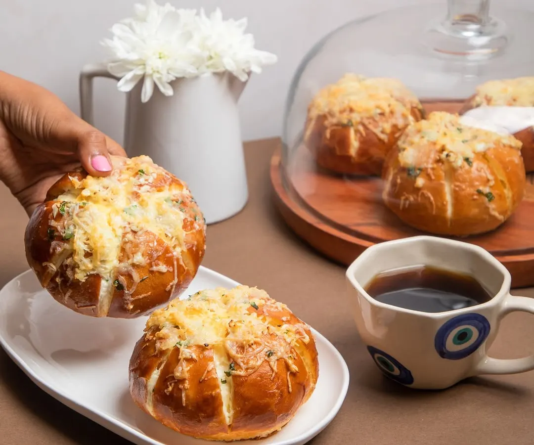 You have to try my signature Korean Cream Cheese Buns. They are fluffy, savory, and filled with a garlic cream cheese that is absolutely addictive. These are always the first to disappear at any party.