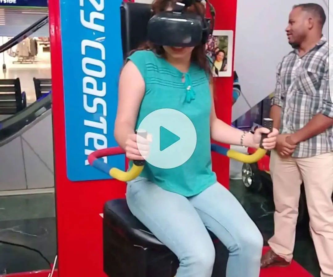 Here is one of our riders fully immersed in the Crazy Coaster VR experience. With the headset on and hands on the controls, she is navigating thrilling twists and drops, all while our motion-sync chair brings the virtual world to life. We are always on hand to ensure a safe and exciting adventure.
