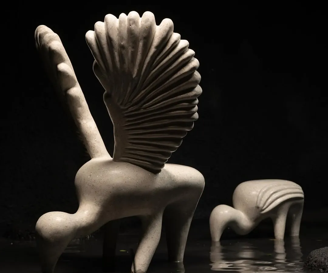 The Pakhru Collection, meaning 'bird' in Marathi, is a story of family. These swan sculptures, crafted from terrazzo with mother-of-pearl, represent grace and connection. They are not just chairs; they are art pieces that bring a sense of quiet elegance and togetherness to a room.