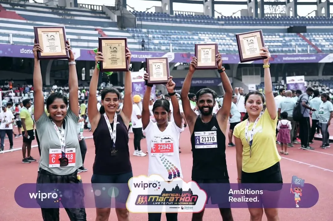 I am incredibly proud of our runners celebrating their podium finishes at the Wipro Bengaluru Marathon. This picture captures the result of their dedication and our collective hard work. Seeing our community members achieve their ambitions is my greatest reward.