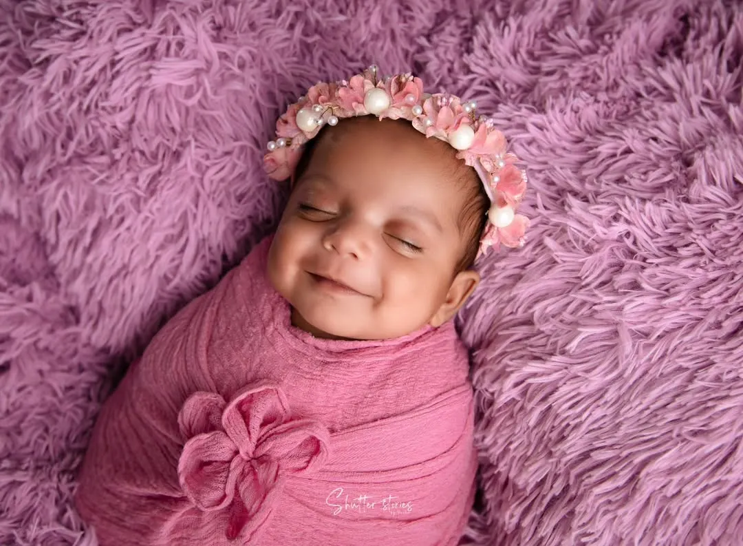 The pure joy of a perfectly captured newborn smile. Learning to anticipate and capture these fleeting expressions is a key part of my 2-day deep dive workshop, where we focus on live shoot practice.