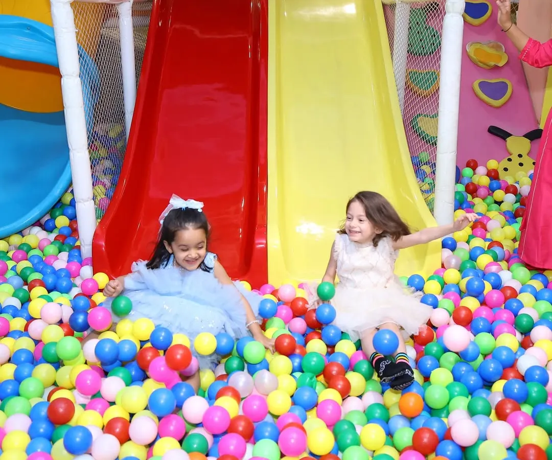 Our giant ball pit and double slides are always a huge hit. It's a colorful sea of fun where kids can dive, slide, and laugh together in a safe, soft-play environment.