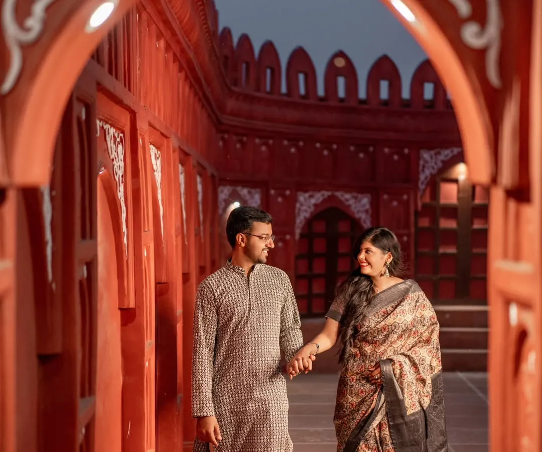 Our royal Indian sets truly come alive at night. This shot, taken in our Lal Kila inspired corridor, shows how the lighting creates a warm, intimate, and majestic atmosphere for your evening shoots.