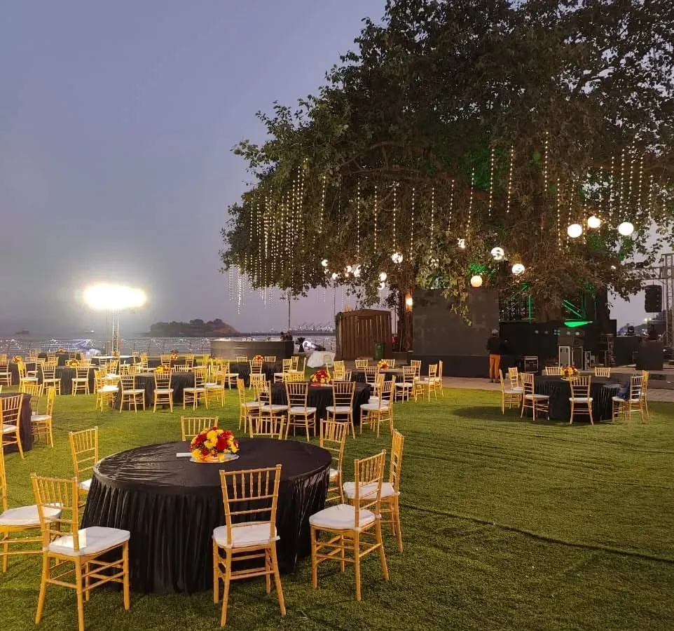 An evening view of a large-scale outdoor event we catered. We handle everything from the menu to the setup, ensuring a seamless experience for hundreds of guests, as seen here at the Belgian King's Day celebration.
