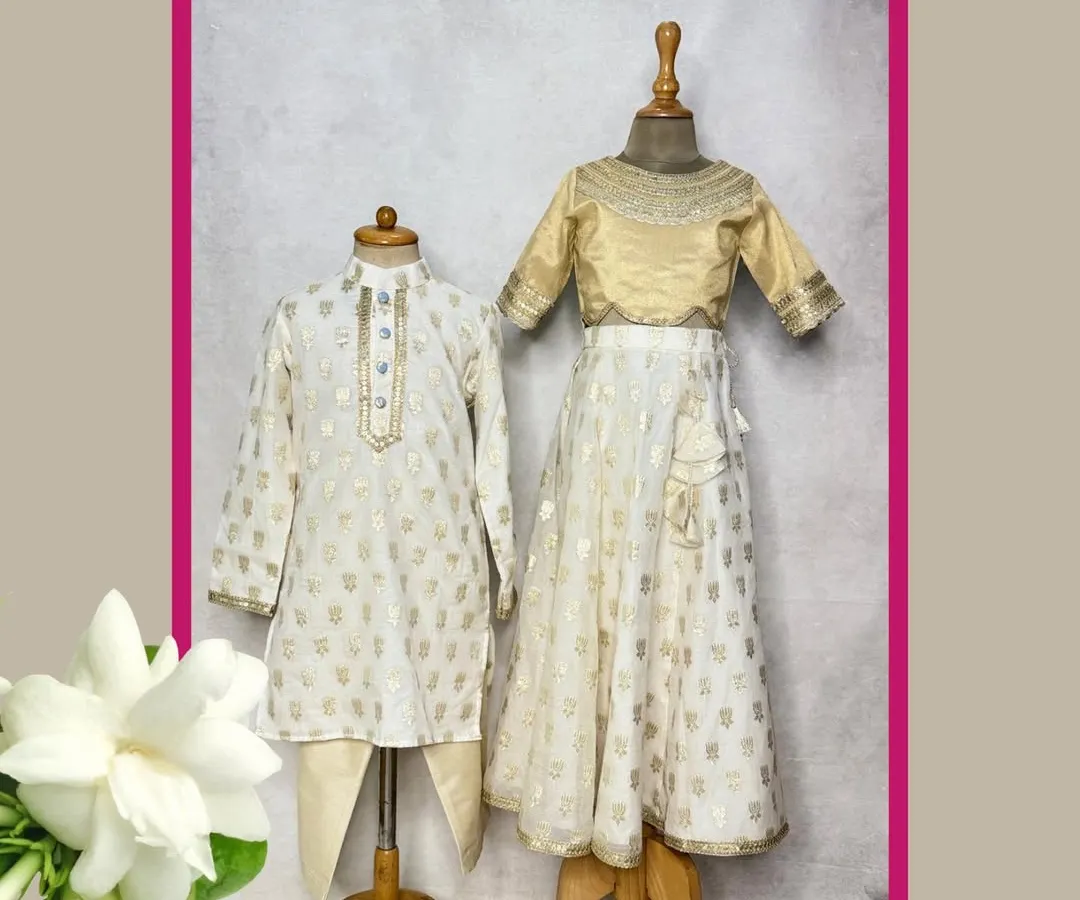 For a ghar ki shaadi or Diwali, nothing beats the elegance of our Mogra collection. We designed this coordinated brother-sister set in classic white and gold for a timeless festive look.