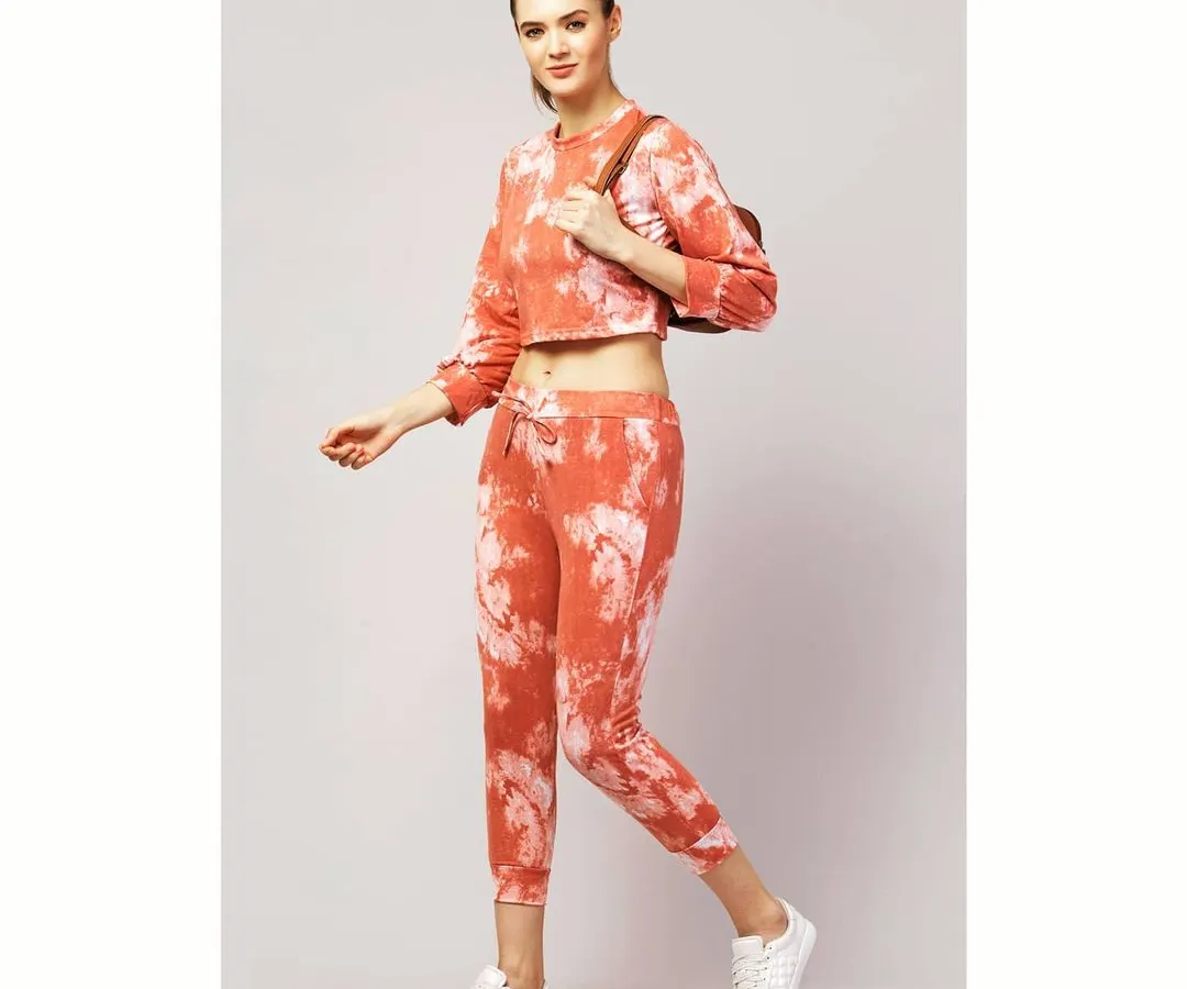 We shoot full-body catalogue photos that show how clothing fits and moves. This look for a tie-dye co-ord set is a great example of a clean, e-commerce ready image that helps sell products.