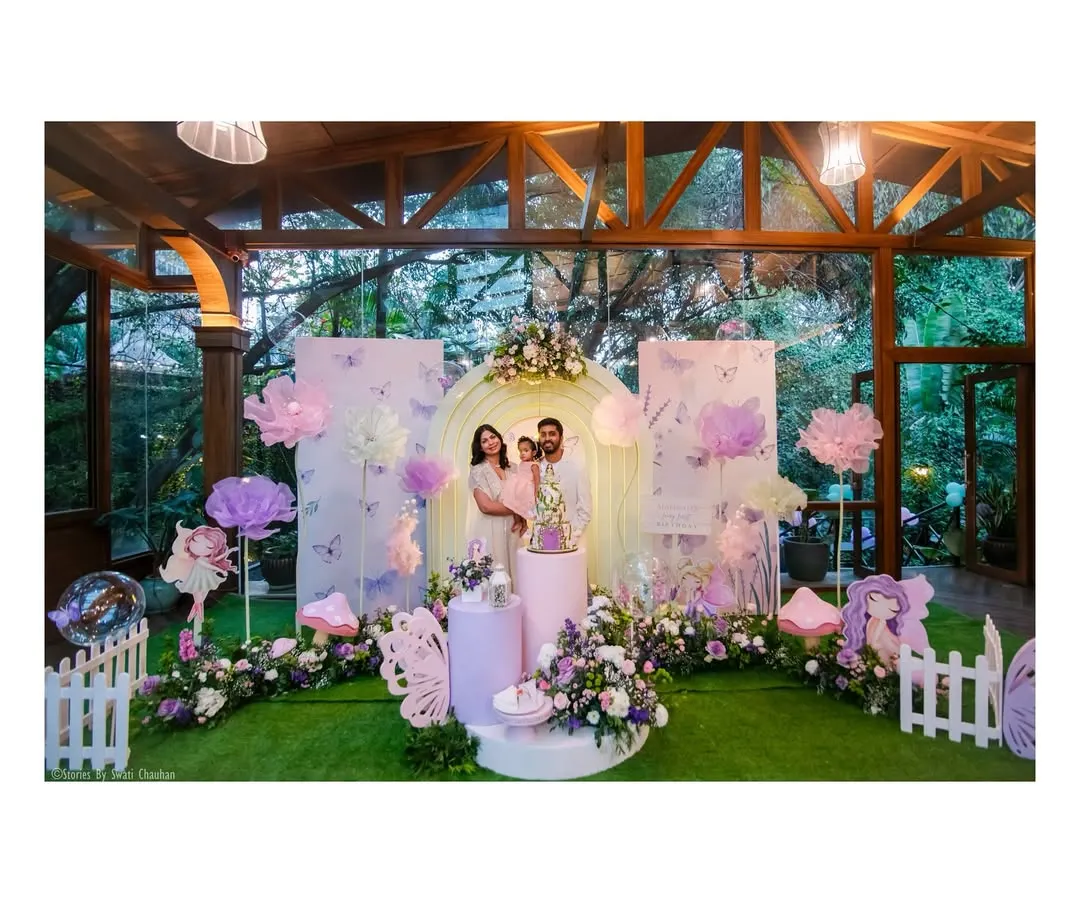 A glimpse into a magical fairy-themed first birthday we designed. The setup includes a custom-arched backdrop, pastel butterfly and floral details, and a beautifully styled cake display, all coming together to create an enchanting garden atmosphere.