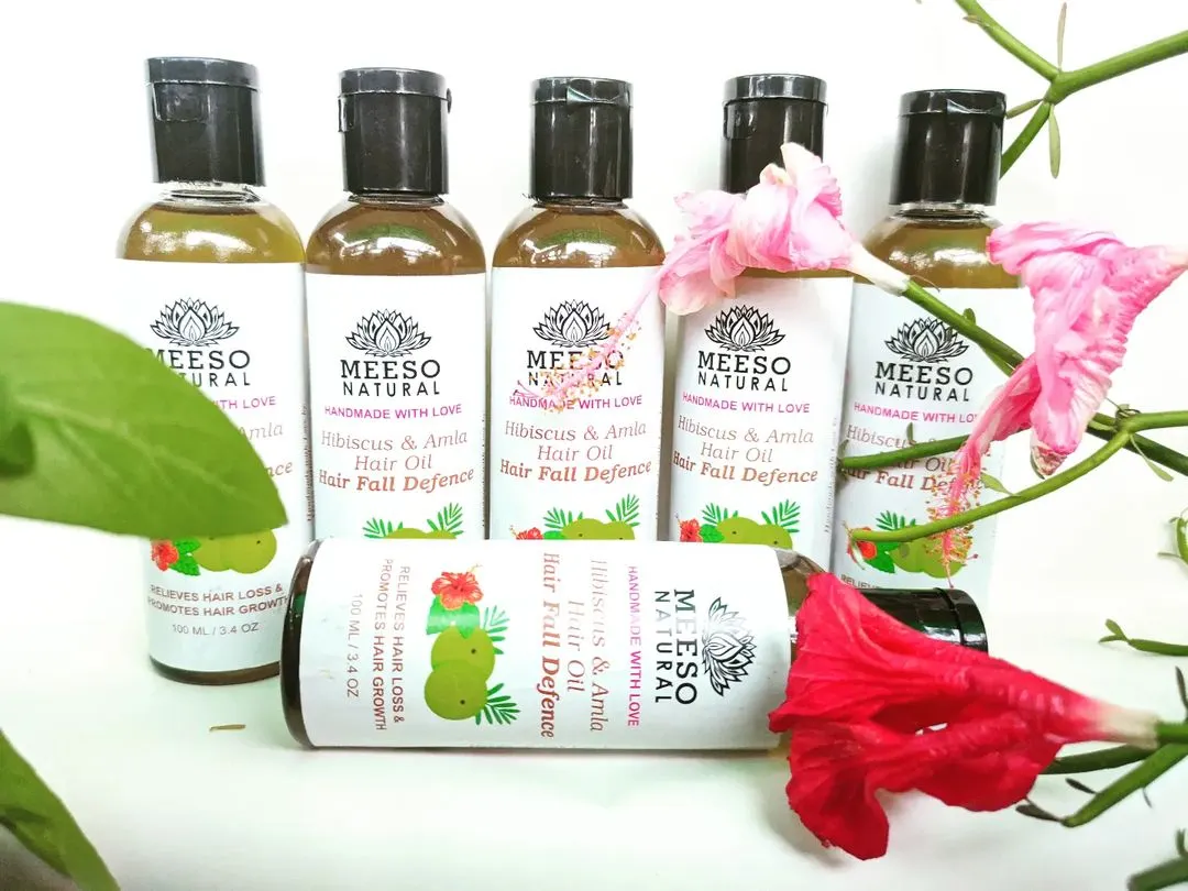 This is our Hibiscus & Amla Hair Oil, a customer favorite for tackling hair fall. We craft this hair fall defense oil using a traditional Ayurvedic blend of 6 different oils and 14 special herbs from our Nani's recipe book to strengthen roots and promote new growth.