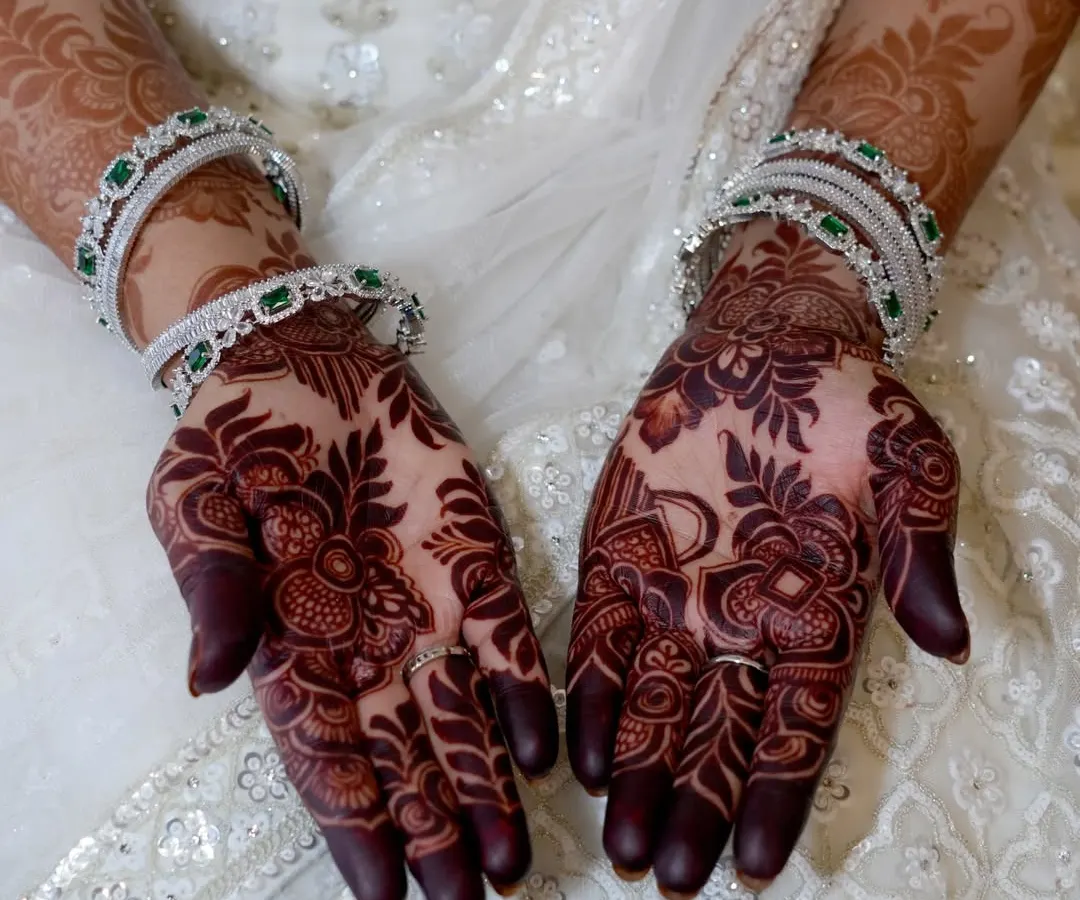 The stain is everything. This photo showcases the gorgeous, deep maroon stain from my all-natural, organic henna, captured on an engagement bride. This is the rich, chemical-free color I promise and deliver.