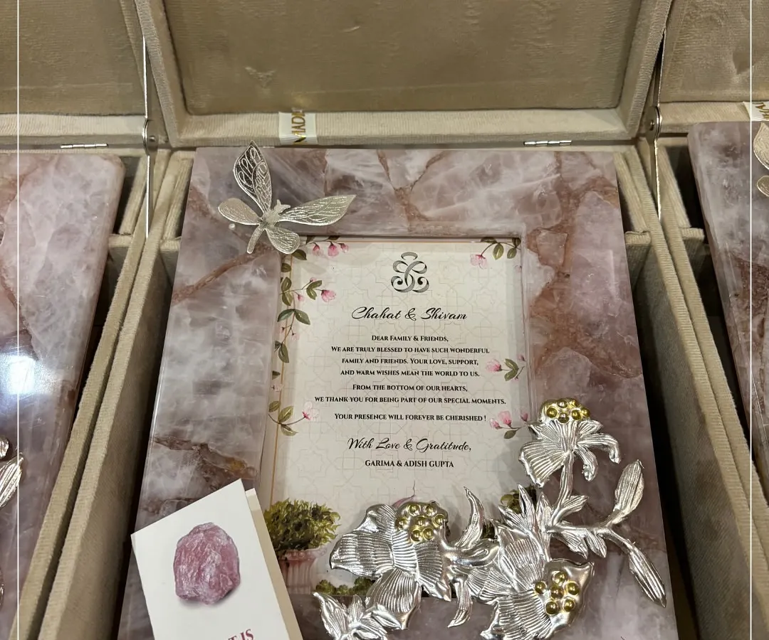 I believe a gift should be soulful. This Rose Quartz Aura photo frame, the stone of universal love, is paired with a personalized invitation and presented in a bespoke box. It’s a wedding invite that your guests will treasure forever.