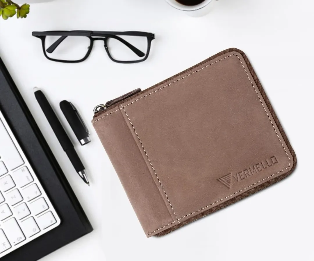 This is our super-soft genuine leather zip wallet, shown here in a professional workspace setting. Its compact and secure design is perfect for the modern business professional, offering both style and RFID protection.